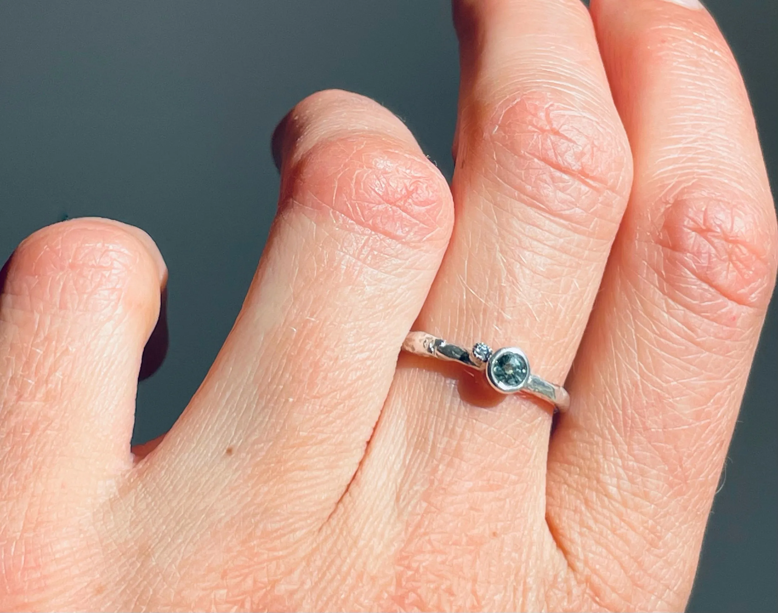 Green sapphire and Diamond silver ring