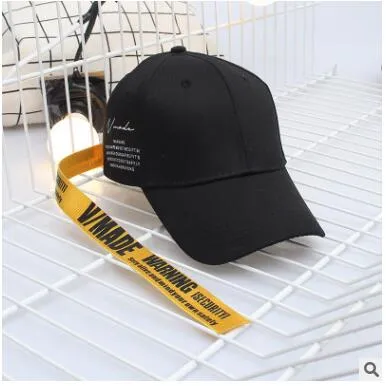 Yellow long strap letter curved baseball hat men and women personality trend wild bend skull cap