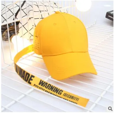 Yellow long strap letter curved baseball hat men and women personality trend wild bend skull cap